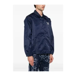 Blå vandafvisende vest med trykknaplukning