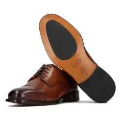 Brune sko med overlappende tæer