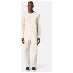 Hvide bukser med trykknapper