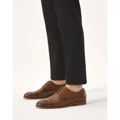 Læder halvsko med rosetdekoration på hælen