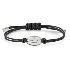 Varemærkearmbånd i sterlingsølv og sort læderrem med oval mærke