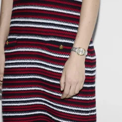 YA166503 - G-Flat 24mm rustfrit stål urkasse med 18 kt guldbelagt bezel og skruer; Sølvforzinket skive med romerske indekser kl. 12 og 6 og diamantindekser; Rustfrit stål armbånd